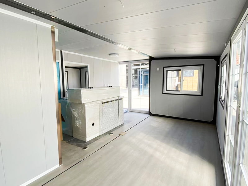 Erweiterbarer Doppelflügel-Containerraum für Wohnzwecke